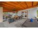 Spacious covered patio with outdoor seating and dining area at 538 Bamboo Ln, Clearwater, FL 33764