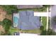 Aerial view of a lovely home featuring a screened pool, well-manicured lawn, and patio at 5931 Cherry Oak Dr, Valrico, FL 33596