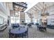 Community ballroom with coffered ceilings, fireplace, and table seating at 5931 Cherry Oak Dr, Valrico, FL 33596