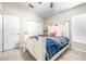This bedroom boasts carpet flooring, a ceiling fan, 1 window for natural light, and closet at 5931 Cherry Oak Dr, Valrico, FL 33596