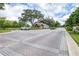 Charming gated community entrance with brick-paved road and a security guardhouse at 5931 Cherry Oak Dr, Valrico, FL 33596