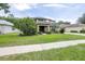 Charming home with a well-kept lawn, mature trees, and inviting curb appeal in a quiet neighborhood at 5931 Cherry Oak Dr, Valrico, FL 33596