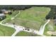 Aerial view of golf course with golf carts and lush green fairways at 5931 Cherry Oak Dr, Valrico, FL 33596