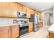 This kitchen showcases stainless steel appliances, generous countertop space and lots of cabinet space at 5931 Cherry Oak Dr, Valrico, FL 33596