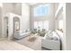 Bright living room with expansive windows, neutral color palette, and an open, airy feel at 5931 Cherry Oak Dr, Valrico, FL 33596