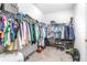 Walk-in closet with shelving and clothing racks, ready for organization at 5931 Cherry Oak Dr, Valrico, FL 33596