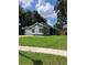 Charming single-story home with well-maintained lawn and attached garage at 6905 Summer Harbor Ln, Riverview, FL 33578