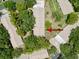 Overhead shot of property showcasing roof and surrounding tree coverage at 8320 High Point Cir # 5, Port Richey, FL 34668