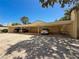 Carport with dedicated covered parking spots for residents and extra storage at 8320 High Point Cir # 5, Port Richey, FL 34668