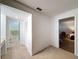 Hallway with access to bathroom, walk-in closet, and bedroom at 8320 High Point Cir # 5, Port Richey, FL 34668