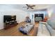 Bright living room featuring ceiling fan and nice seating at 8320 High Point Cir # 5, Port Richey, FL 34668