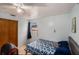 Comfortable bedroom with luxury vinyl plank flooring and closet at 8401 Pinewood St, Tampa, FL 33615