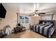 Comfortable bedroom featuring a TV and a modern console table at 8401 Pinewood St, Tampa, FL 33615
