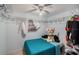 Bedroom featuring a walk-in closet with overhead storage at 8401 Pinewood St, Tampa, FL 33615