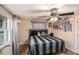 Cozy bedroom with a ceiling fan and natural light from the window at 8401 Pinewood St, Tampa, FL 33615