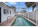 Relaxing screened-in pool with clear blue water, ideal for outdoor enjoyment and recreation at 8401 Pinewood St, Tampa, FL 33615