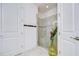 Bright bathroom showing a tiled walk-in shower with glass doors, and tile flooring at 8433 Alberata Vista Dr, Tampa, FL 33647