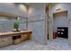 Comfortable bathroom with double sinks, stylish tiling, and shower stall at 8433 Alberata Vista Dr, Tampa, FL 33647