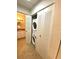 Conveniently located in-unit stacked washer and dryer closet near the bathroom at 850 S Tamiami Trl # 424, Sarasota, FL 34236