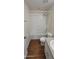 Well-maintained bathroom with a shower-tub and updated flooring at 8814 Walnut Gable Ct, Riverview, FL 33578