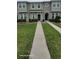 Inviting townhouse with well-maintained landscaping and neutral exterior paint at 8814 Walnut Gable Ct, Riverview, FL 33578