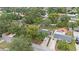 Aerial view of the home, landscaped yard, and neighborhood surroundings at 919 Alpine Dr, Brandon, FL 33510