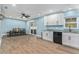 Bright eat-in kitchen featuring granite countertops, stainless steel appliances, and sliding glass doors at 919 Alpine Dr, Brandon, FL 33510
