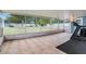 Spacious screened porch featuring tile flooring and plenty of natural light at 919 Alpine Dr, Brandon, FL 33510