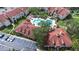 Aerial view of community pool and clubhouse at 9481 Highland Oak Dr # 1504, Tampa, FL 33647