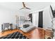 This bedroom features hardwood floors, a bunkbed, and neutral modern design at 9481 Highland Oak Dr # 1504, Tampa, FL 33647