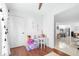 View from a play area into the living, dining, and kitchen areas of the home at 9481 Highland Oak Dr # 1504, Tampa, FL 33647