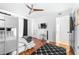 This bedroom features hardwood floors, a bunkbed, and neutral modern design at 9481 Highland Oak Dr # 1504, Tampa, FL 33647
