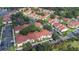 Overhead view of the community with lush landscaping and mature trees at 9481 Highland Oak Dr # 1504, Tampa, FL 33647