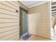 Cozy condo entrance featuring a welcome mat and the unit number 1504 at 9481 Highland Oak Dr # 1504, Tampa, FL 33647