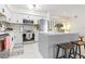 Well-lit condo kitchen featuring stainless steel appliances and ample counter space at 9481 Highland Oak Dr # 1504, Tampa, FL 33647