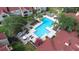 Relaxing pool area with lounge chairs and umbrellas at 9481 Highland Oak Dr # 1504, Tampa, FL 33647