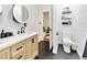Bathroom featuring sink, toilet, and decor at 9615 Raiden Ln, Riverview, FL 33569