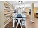 Inviting dining area adjacent to the kitchen, showcasing modern decor and an open layout for seamless entertaining at 9615 Raiden Ln, Riverview, FL 33569