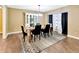 Dining room featuring a decorative hutch, chandelier, and a geometric pattern rug at 9615 Raiden Ln, Riverview, FL 33569