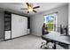 Versatile bedroom with Murphy bed, blending style and functionality for a cozy atmosphere at 16121 Soft Fern Trace, Odessa, FL 33556