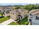 Aerial view of a well maintained two-story home with green grass and landscaping at 16121 Soft Fern Trace, Odessa, FL 33556