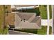 Aerial view of a house roof, showing the texture and design at 16121 Soft Fern Trace, Odessa, FL 33556