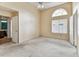 Bedroom featuring carpet floors, a window, neutral colored walls and bathroom access at 10208 Evening Trail Dr, Riverview, FL 33569