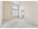 Bedroom featuring carpet floors, a window, neutral colored walls and bathroom access at 10208 Evening Trail Dr, Riverview, FL 33569