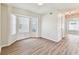 Hardwood dining room featuring a bay window and neutral paint at 10208 Evening Trail Dr, Riverview, FL 33569