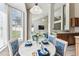 Staged kitchen featuring an island, stainless steel appliances, and plenty of cabinet space at 10208 Evening Trail Dr, Riverview, FL 33569