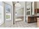 Open floorplan kitchen featuring tile flooring and stainless steel appliances at 10208 Evening Trail Dr, Riverview, FL 33569