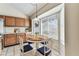 Charming staged kitchen nook with a dining table set for a meal at 10208 Evening Trail Dr, Riverview, FL 33569