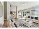 Staged living room showcasing modern decor and furniture at 10208 Evening Trail Dr, Riverview, FL 33569