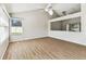 Light-filled room with hardwood floors and clerestory windows providing lots of light at 10208 Evening Trail Dr, Riverview, FL 33569